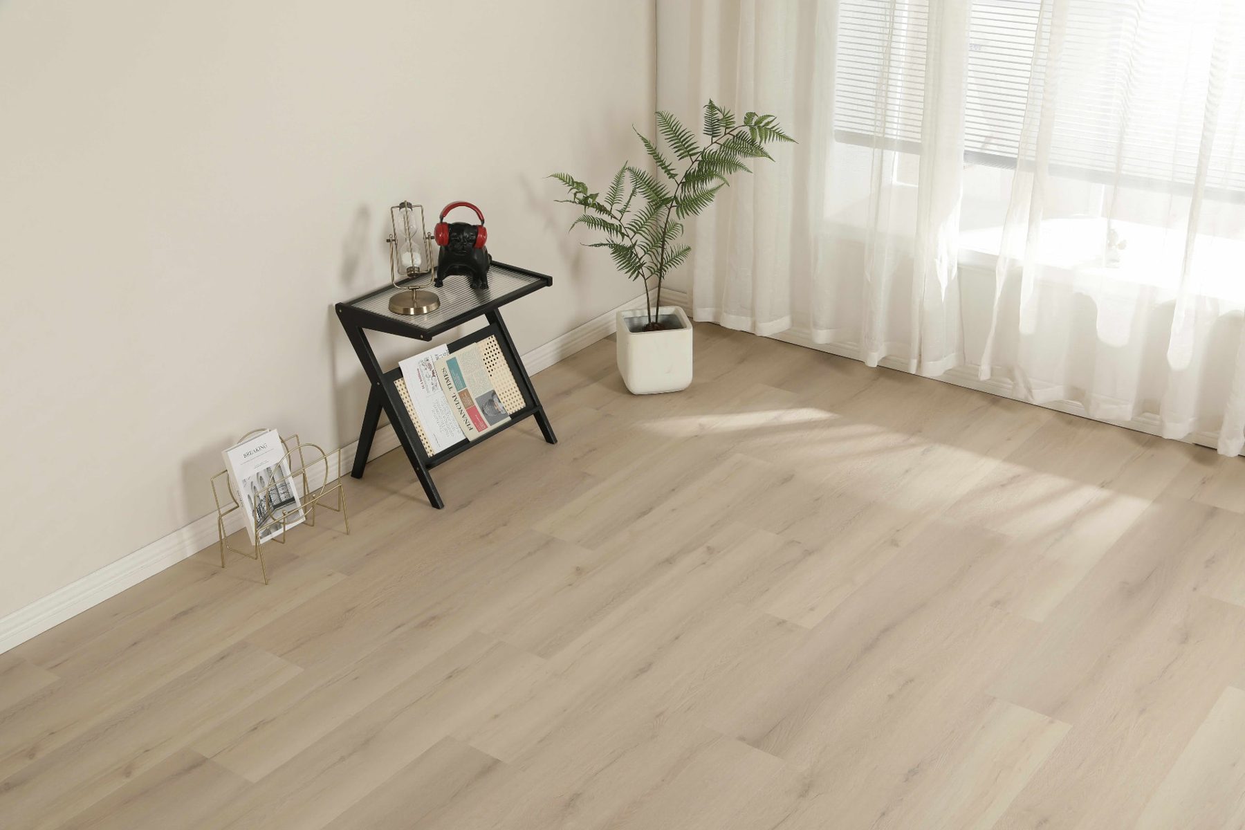 Light vinyl floor next to a window