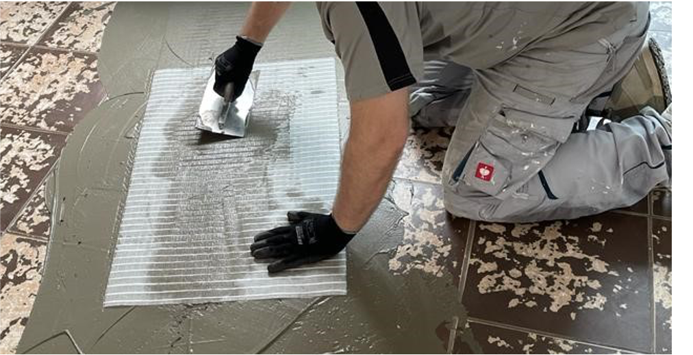 Reinforcing mesh over old tiles